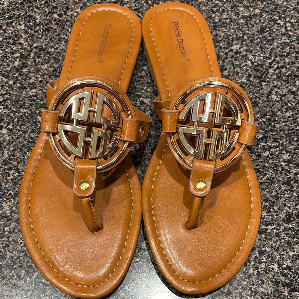 Pierre Dumas Tan leather thong Sandals with gold medallion Detail size 11